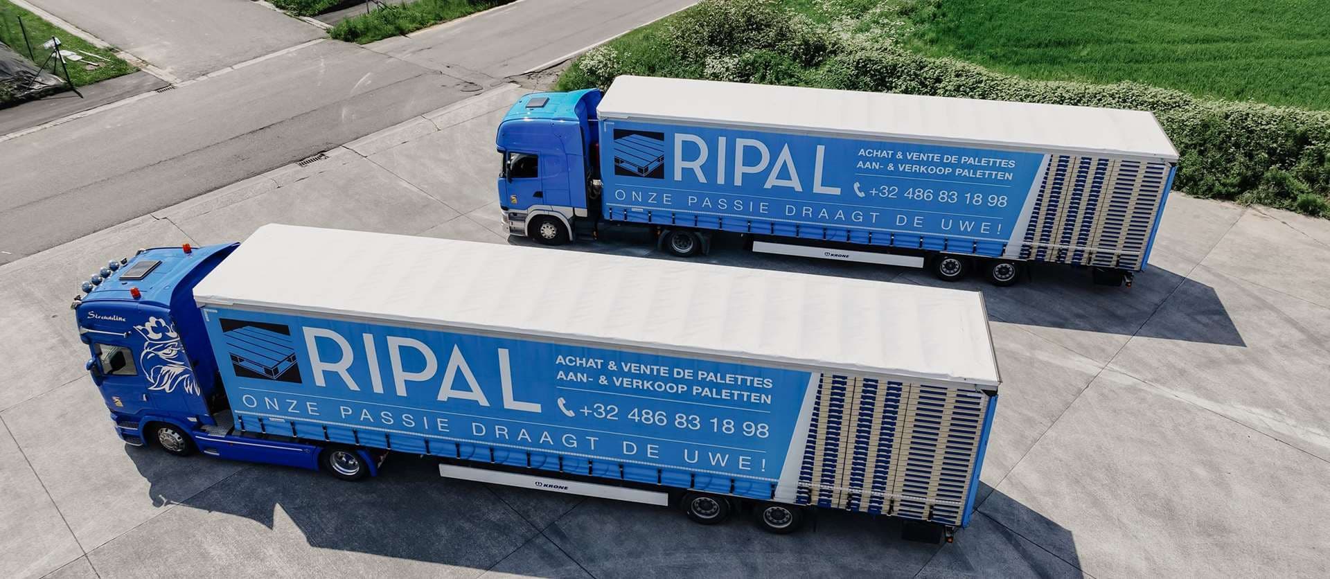 Gestapelde houten pallets bij Ripal